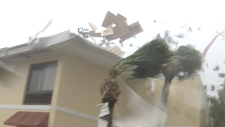 Winds from Hurricane Charley ripping the roof off a Holiday Inn at Punta Gorda Florida Aug. 13, 2004.