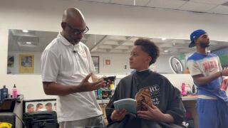 Florida Black-owned barbershop trying to raise literacy levels in Black and brown kids 