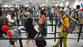 Travelers line up for security clearance at Hartsfield-Jackson Atlanta International Airport